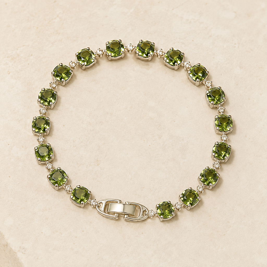 Verdant Gem Tennis Bracelet on a warm ivory studio background