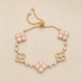 Rosé Clover Mother-of-Pearl-Effect Bracelet on a warm ivory studio background